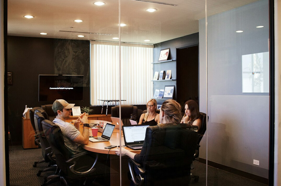 business meeting with tech